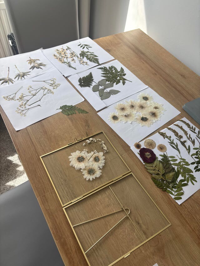 funeral flowers being pressed